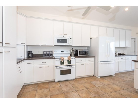 Kitchen. - Single Family Home for sale at 62 Tarpon Way, Placida, FL 33946 - MLS Number is D6121925