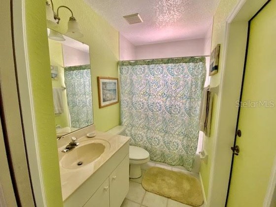 Second Bathroom - Single Family Home for sale at 11 Long Meadow Rd, Rotonda West, FL 33947 - MLS Number is D6121957