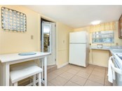 Kitchen for Lower Rental Unit - Duplex/Triplex for sale at 4076 N Beach Rd #10 & 11, Englewood, FL 34223 - MLS Number is D6122744