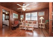 Living Room in Upper Rental Unit - Duplex/Triplex for sale at 4076 N Beach Rd #10 & 11, Englewood, FL 34223 - MLS Number is D6122744