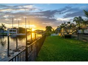 Sunset view from backyard - Single Family Home for sale at 191 N Waterway Dr Nw, Port Charlotte, FL 33952 - MLS Number is C7448624