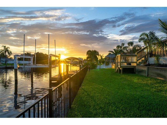 Sunset view from backyard - Single Family Home for sale at 191 N Waterway Dr Nw, Port Charlotte, FL 33952 - MLS Number is C7448624
