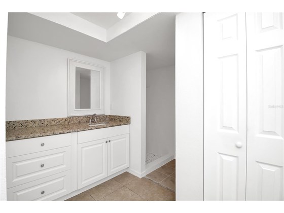 Primary Bathroom - Single Family Home for sale at 120 Sinclair St Sw, Port Charlotte, FL 33952 - MLS Number is C7450500