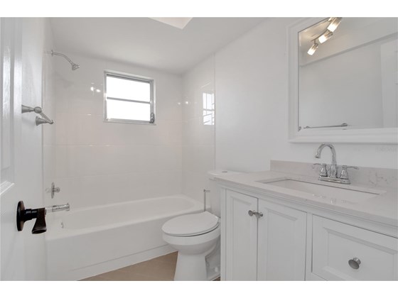 Guest Bathroom - Single Family Home for sale at 120 Sinclair St Sw, Port Charlotte, FL 33952 - MLS Number is C7450500