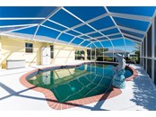 BEAUTIFUL POOL WITH SCREENED CAGE AND  SOUTHERN EXPOSURE!! - Single Family Home for sale at 3400 Colony Ct, Punta Gorda, FL 33950 - MLS Number is C7451906