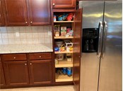 Nice pantry cabinet in the kitchen. - Single Family Home for sale at 4248 Kilpatrick St, Port Charlotte, FL 33948 - MLS Number is C7452734