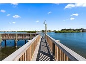 BAYSIDE FISHING PIER - Condo for sale at 1087 W Peppertree Dr #221d, Sarasota, FL 34242 - MLS Number is A4493593