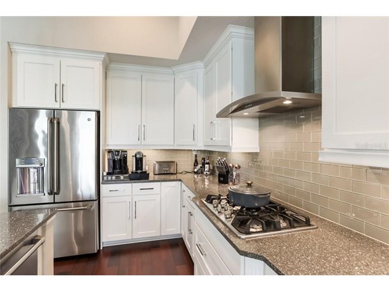 Gas range and GE Monogram appliances - Single Family Home for sale at 3501 Founders Club Dr, Sarasota, FL 34240 - MLS Number is A4497661