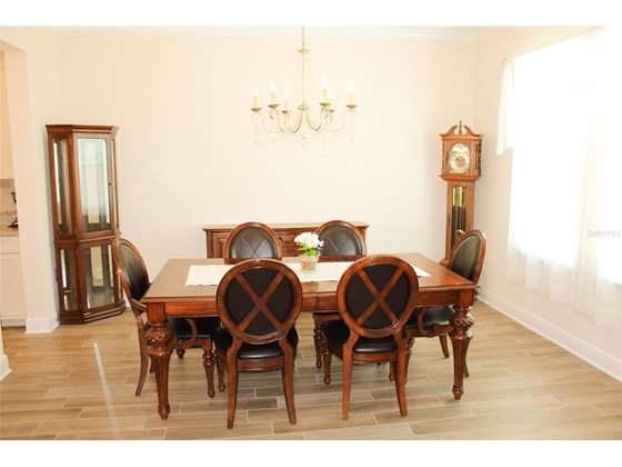 dining room - Single Family Home for sale at 2005 Misty Sunrise Trl, Sarasota, FL 34240 - MLS Number is A4509875