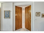 Mahogany Doors the enter into Master Suite - Condo for sale at 370 A Gulf Of Mexico Dr #421, Longboat Key, FL 34228 - MLS Number is A4513966
