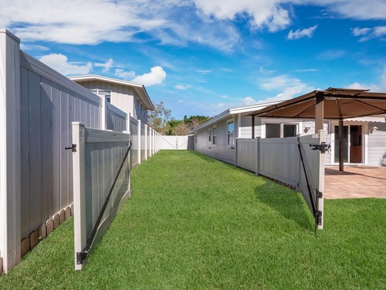 Fully fenced and gated side yard is perfect for RV or boat storage. - Single Family Home for sale at 3070 Hatton St, Sarasota, FL 34237 - MLS Number is A4518301