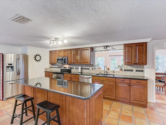 Kitchen - Single Family Home for sale at 5227 Siesta Cove Dr, Sarasota, FL 34242 - MLS Number is A4519271
