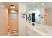 Ensuite Master Bath with walk in shower - Condo for sale at 450 Gulf Of Mexico Dr #B107, Longboat Key, FL 34228 - MLS Number is A4520786