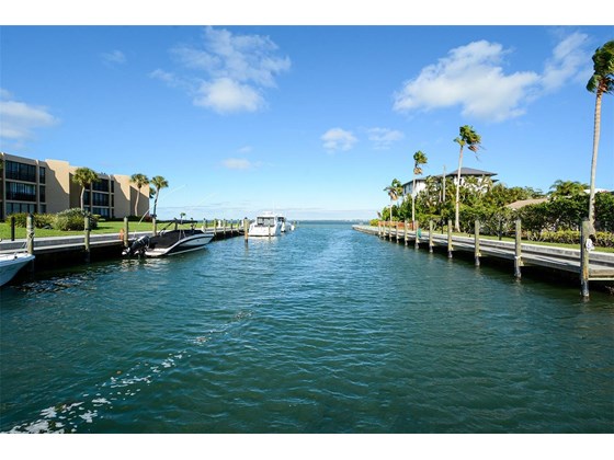 Boat slips, optional, assigned; with water and electricity; Separate marina storage and pool restrooms. Outside shower - Condo for sale at 450 Gulf Of Mexico Dr #B107, Longboat Key, FL 34228 - MLS Number is A4520786