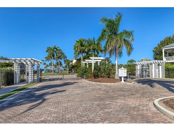 Mariners Landing front gated entrance - Single Family Home for sale at 6751 Portside Ln, Englewood, FL 34223 - MLS Number is N6118322