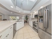 Kitchen to dinette - Single Family Home for sale at 4700 Forbes Trl, Venice, FL 34292 - MLS Number is N6118561